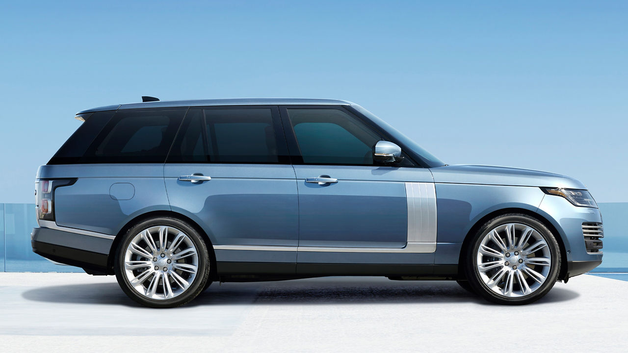 Parked Range Rover outside of glass area