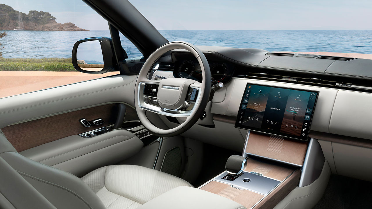 Range Rover interior dashboard and infotainment system.