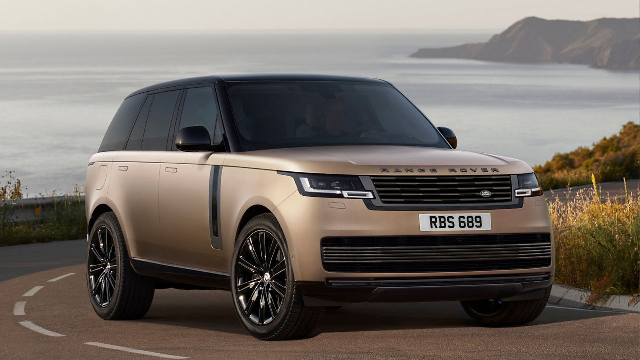 Range Rover golden front sunset view