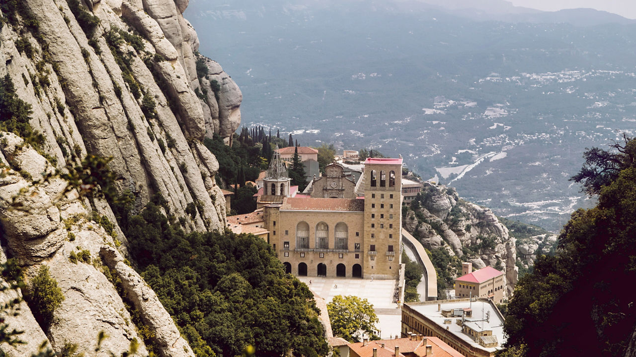 Castle view surrounded by mountains