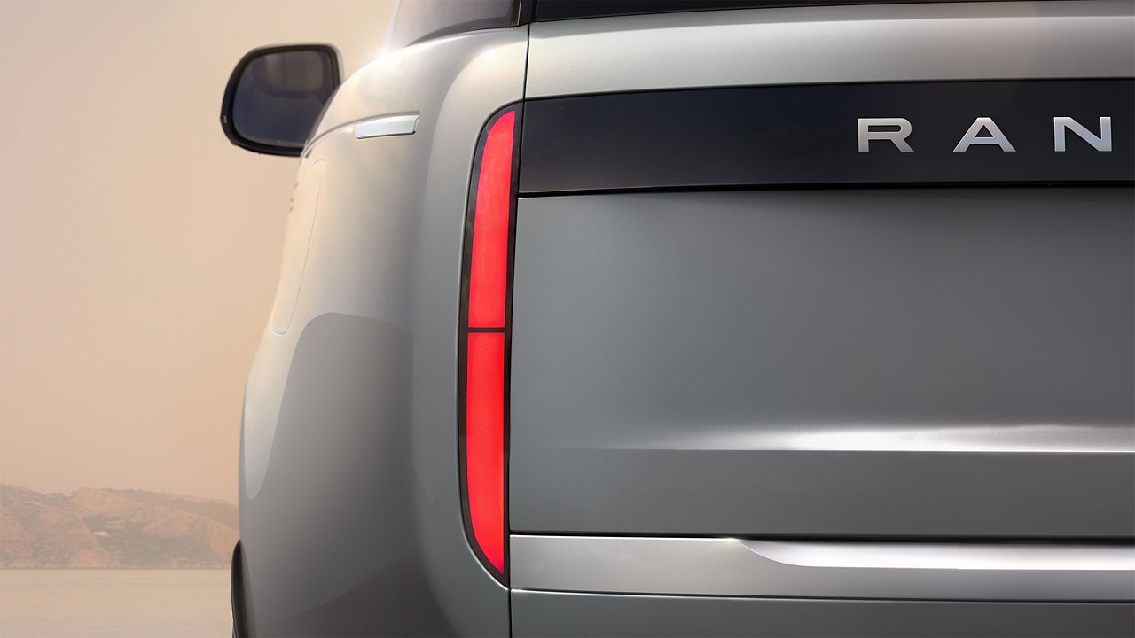 The tail light of a fully electric Range Rover