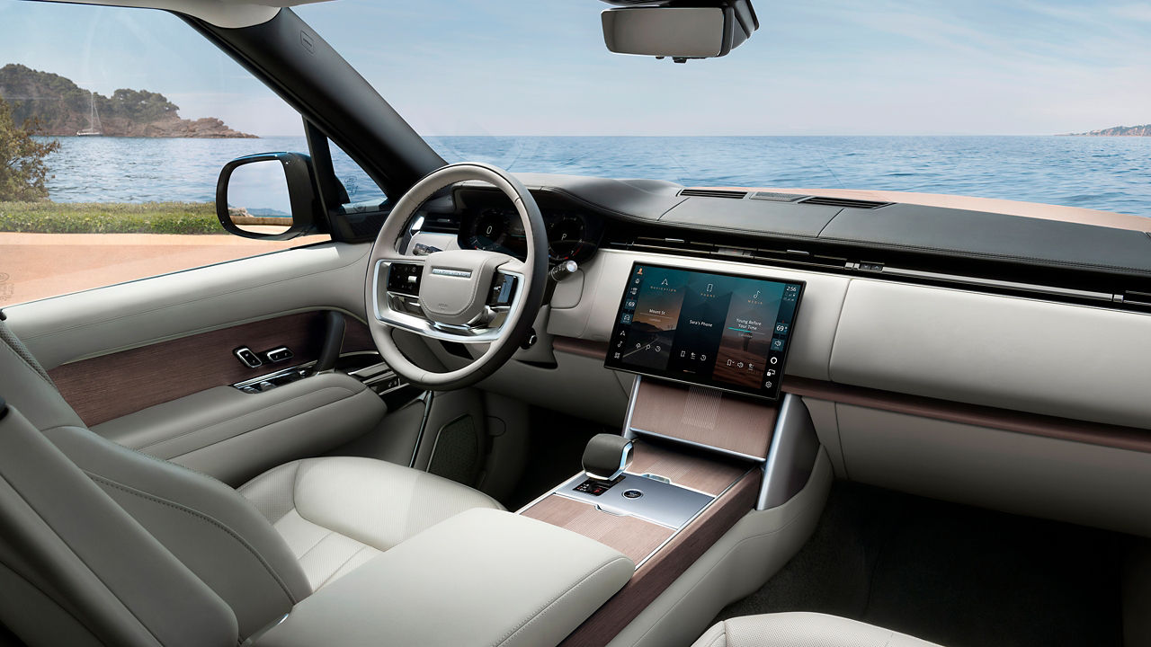 Range Rover interior dashboard and infotainment system.
