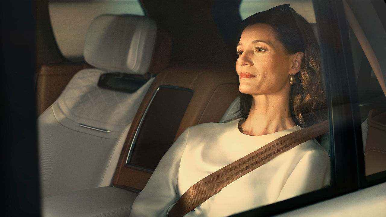 Women siting on back seat