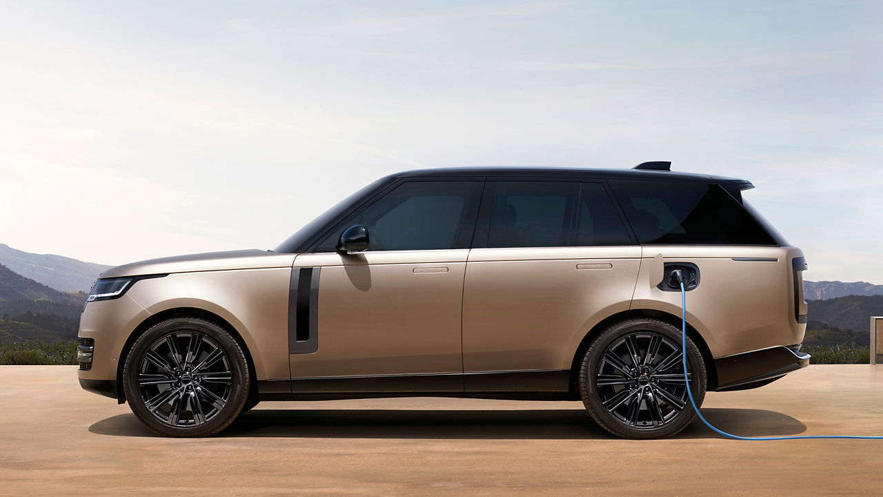 Range Rover parked at EV station