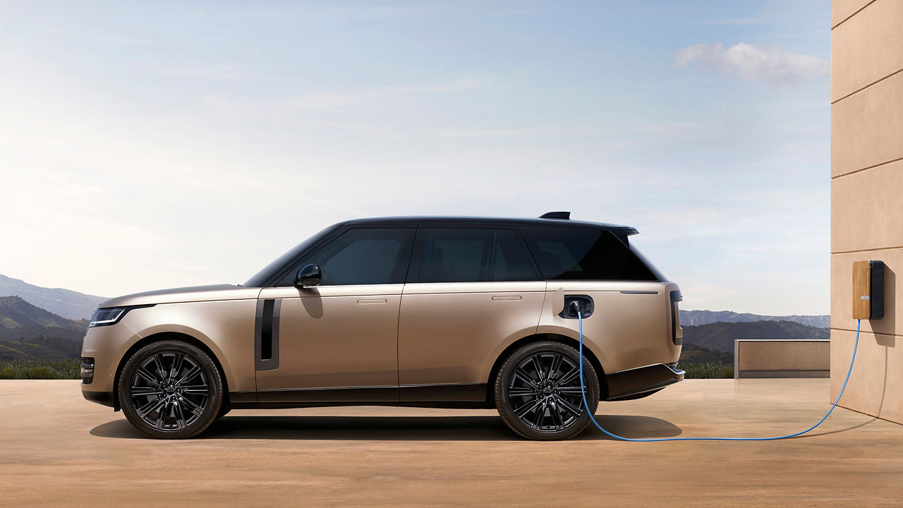Range Rover parked at EV station