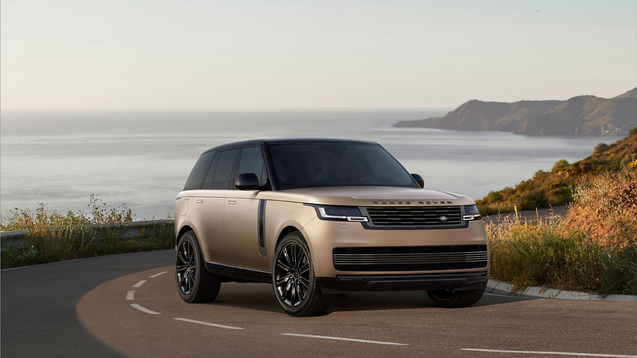 Range Rover on coastal road