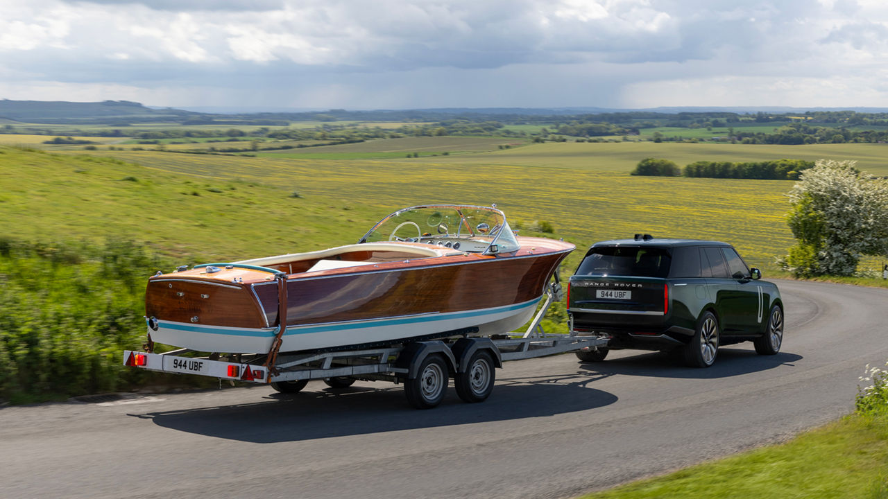Range Rover towing boat