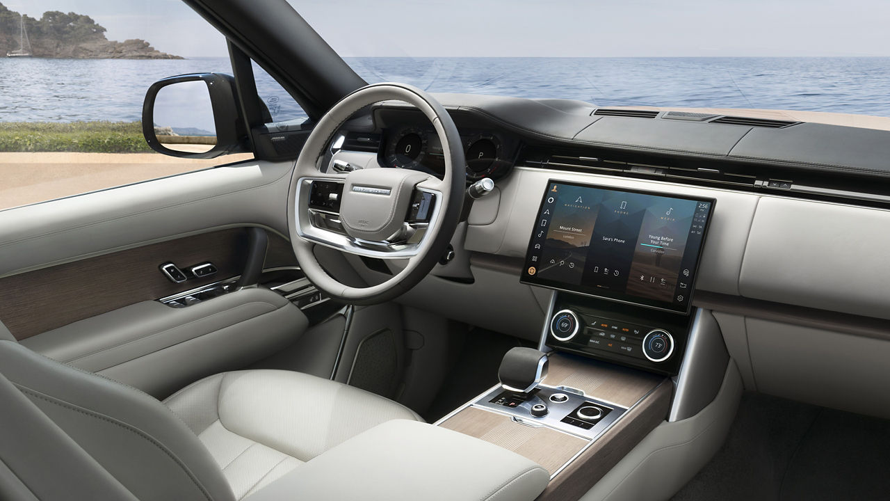 Inside front view of New Range Rover modern luxury system features