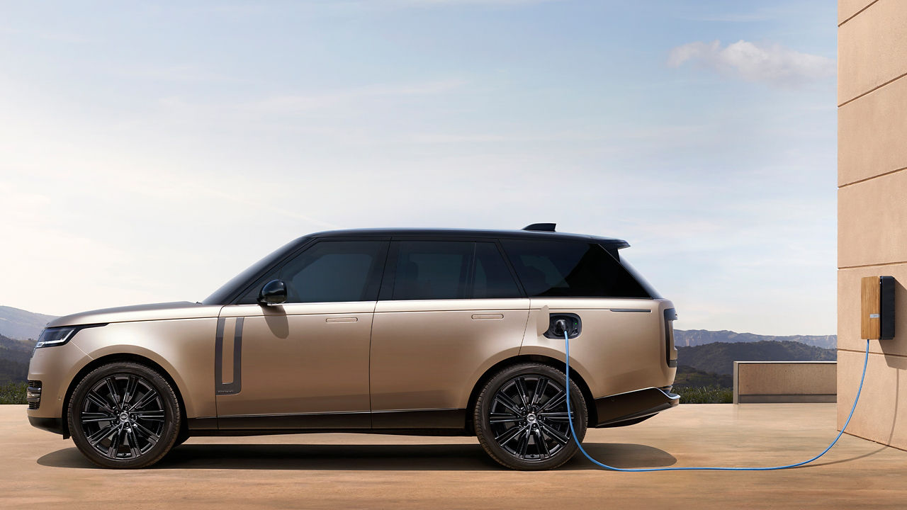 Parked New Range Rover charging at the phev station point