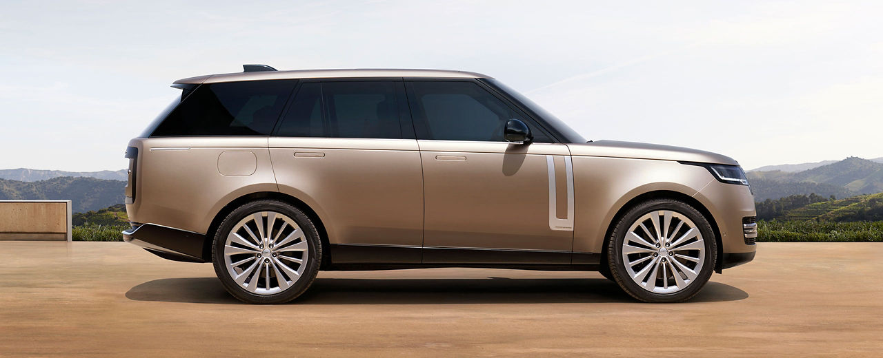 Range Rover gold side view