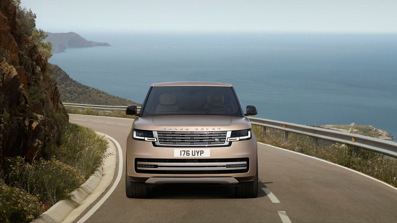 New Range Rover climbing on mountain road