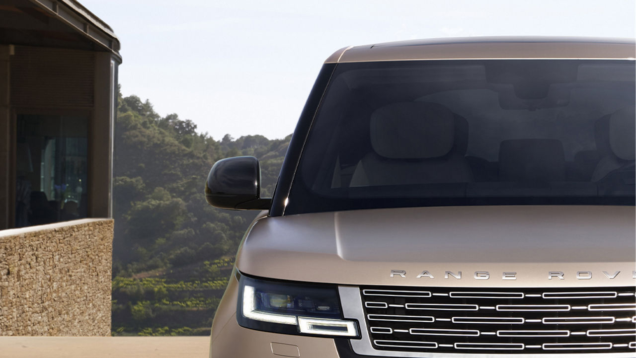Detail view of Range Rover front end.