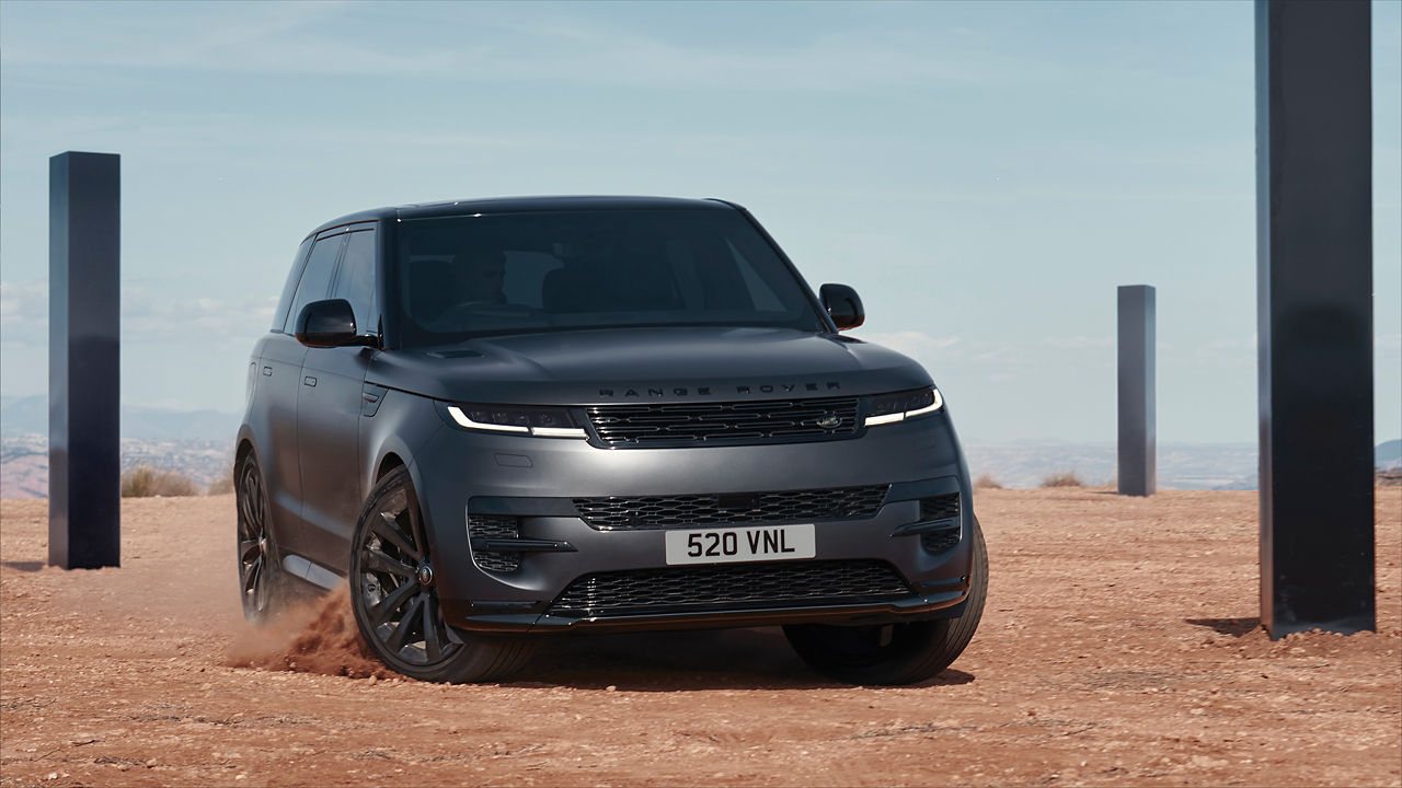 Range Rover Sports Drifting Over Sand Dust Road