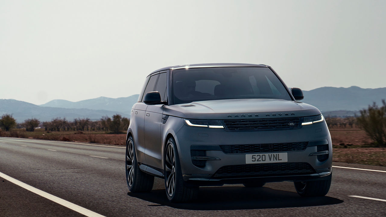 Range Rover Sports front view running on a road