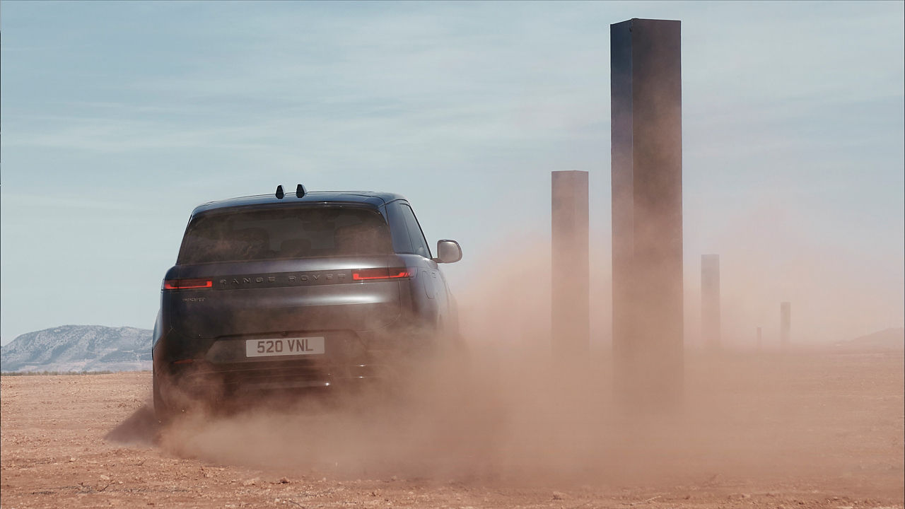 Range Rover Sports Drifting Over Sand Dust Road