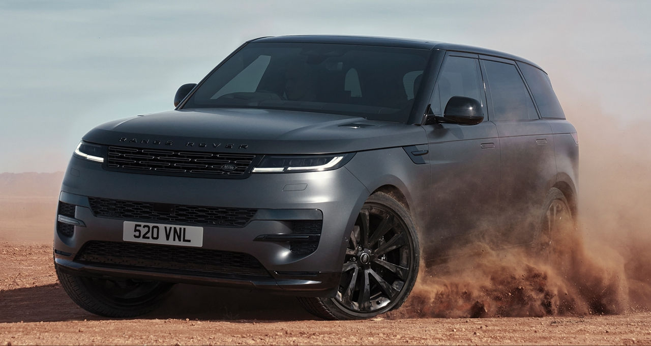 Range Rover Sports Drifting Over Sand Dust Road