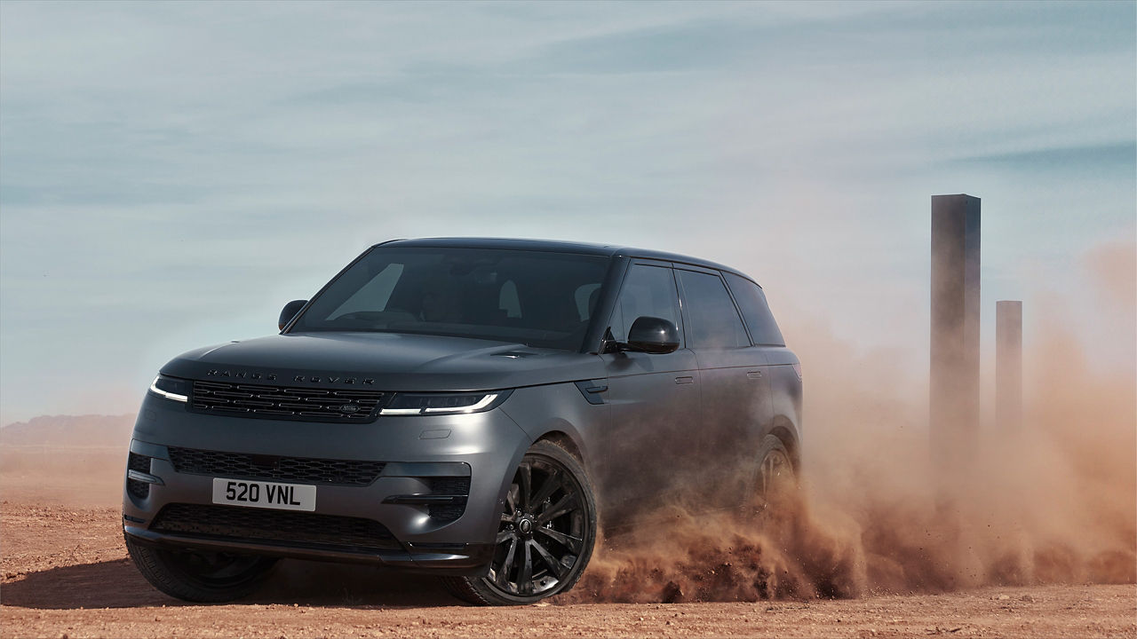 Range Rover Sports Drifting Over Sand Dust Road