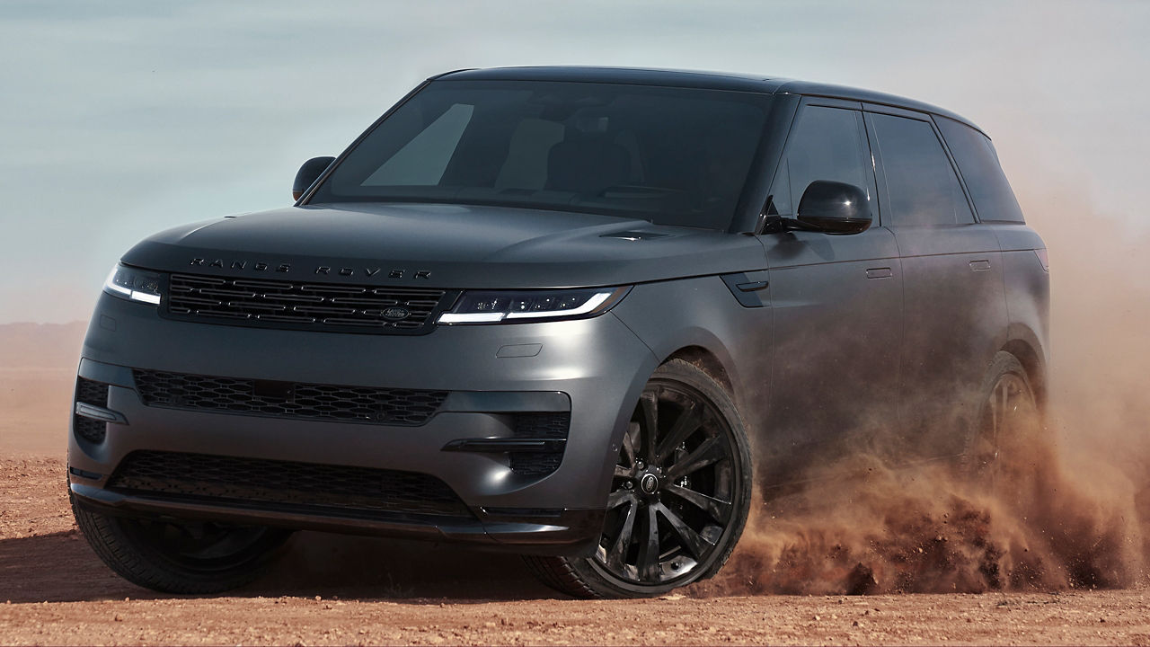 Range Rover Sports Drifting Over Sand Dust Road