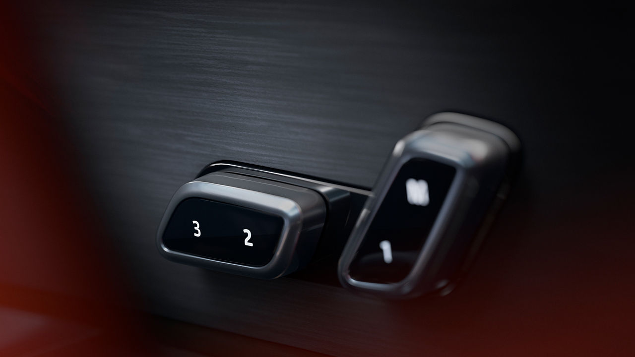 Range Rover Sports Button on black wood