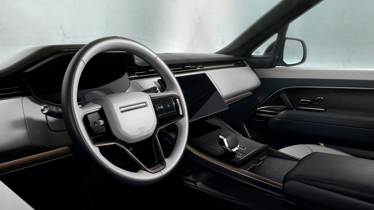 Range Rover Sport interior dashboard and infotainment system.