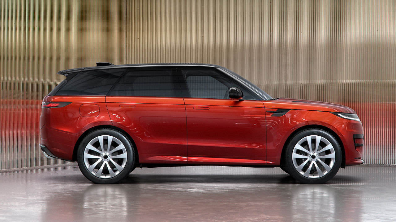 Range Rover Sports parked outside studio side view