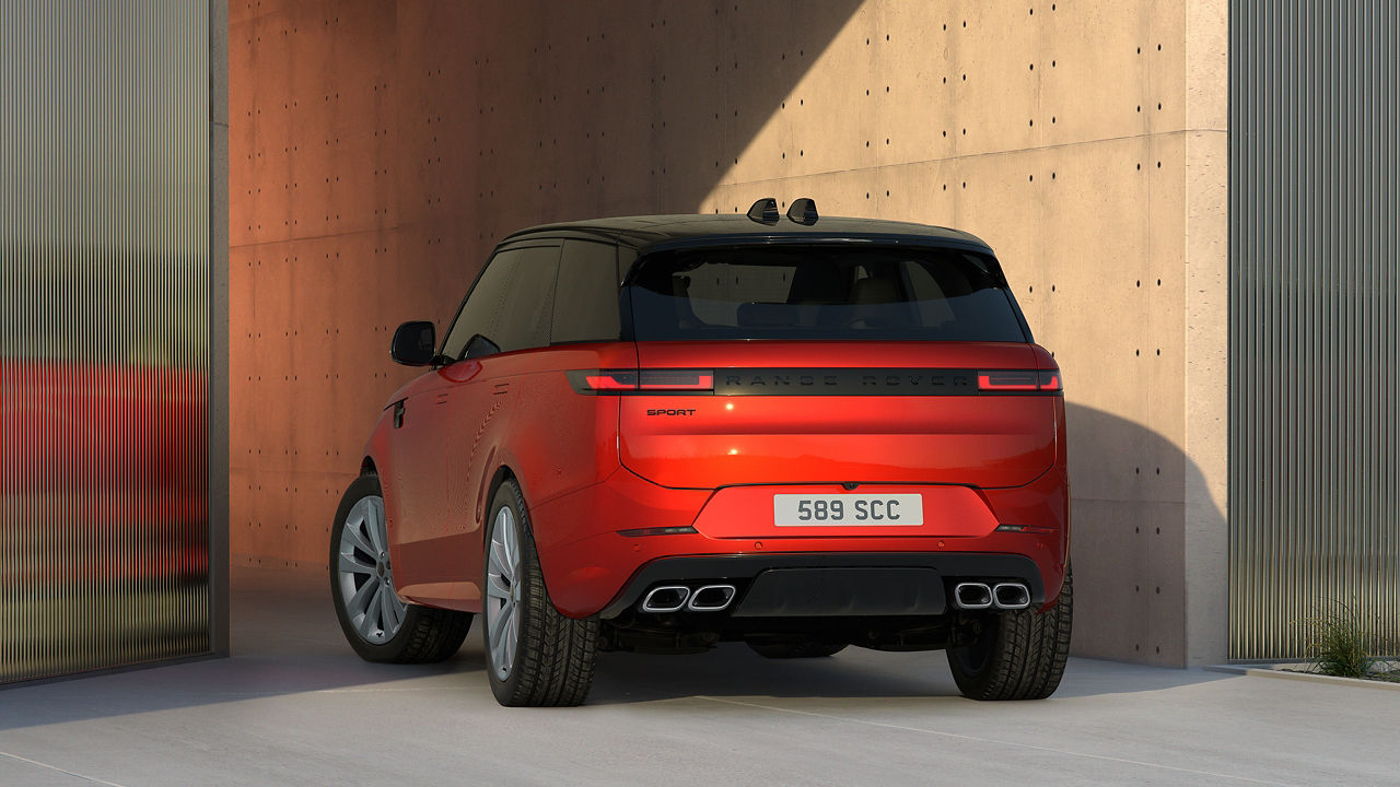 Range Rover Sports parked outside studio back view