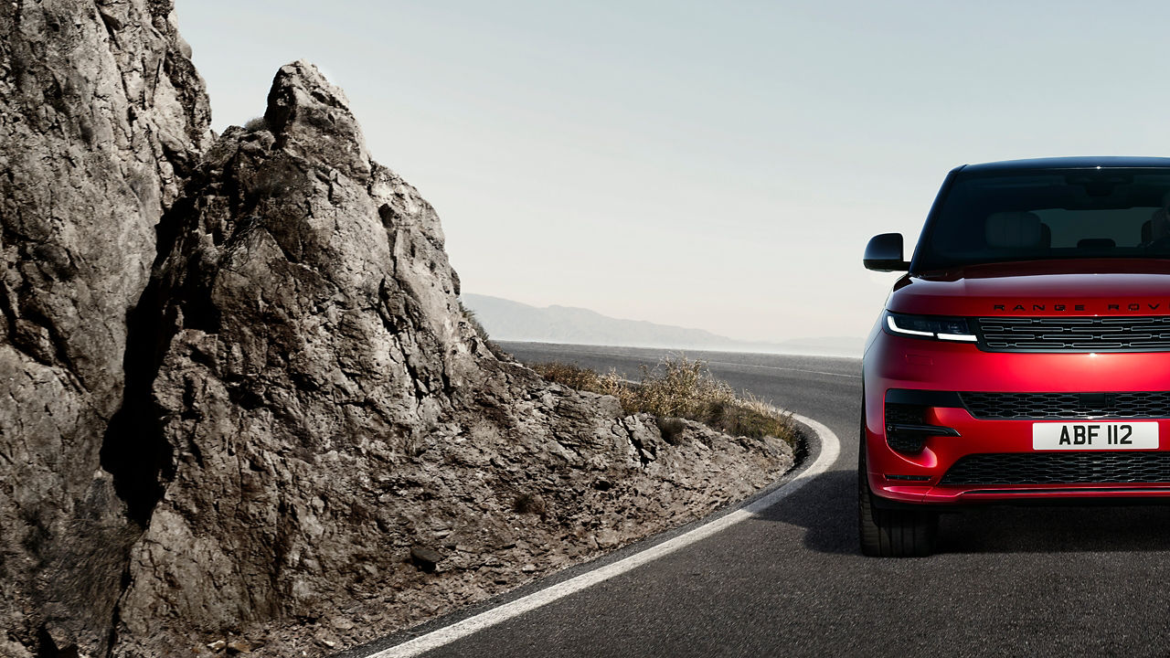 Range Rover Sport down climbing on highway road