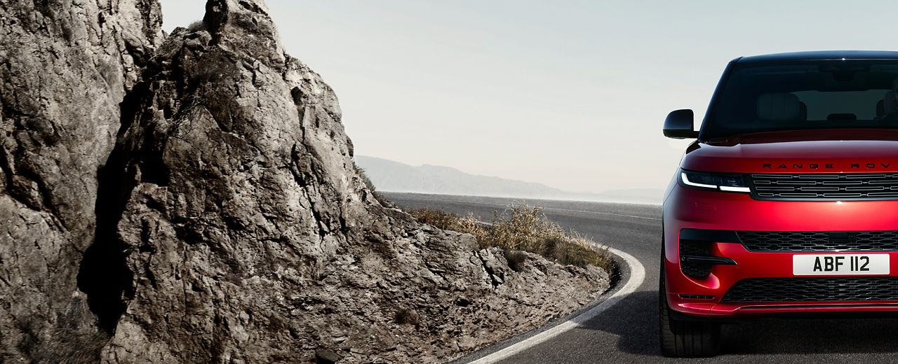 Range Rover Sport down climbing on highway road