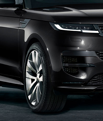 Range Rover Sports Santorini Black front tyre closeup with haedlight