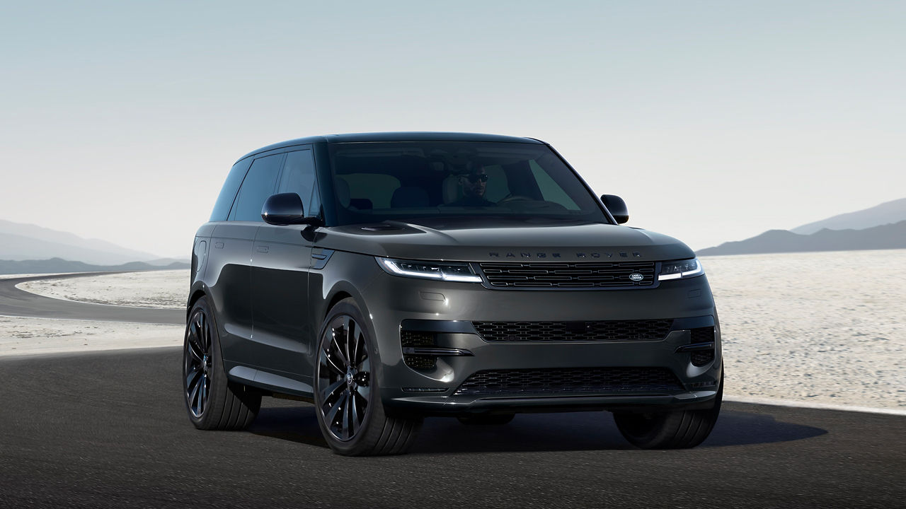 Range Rover Sports parked on curvy road