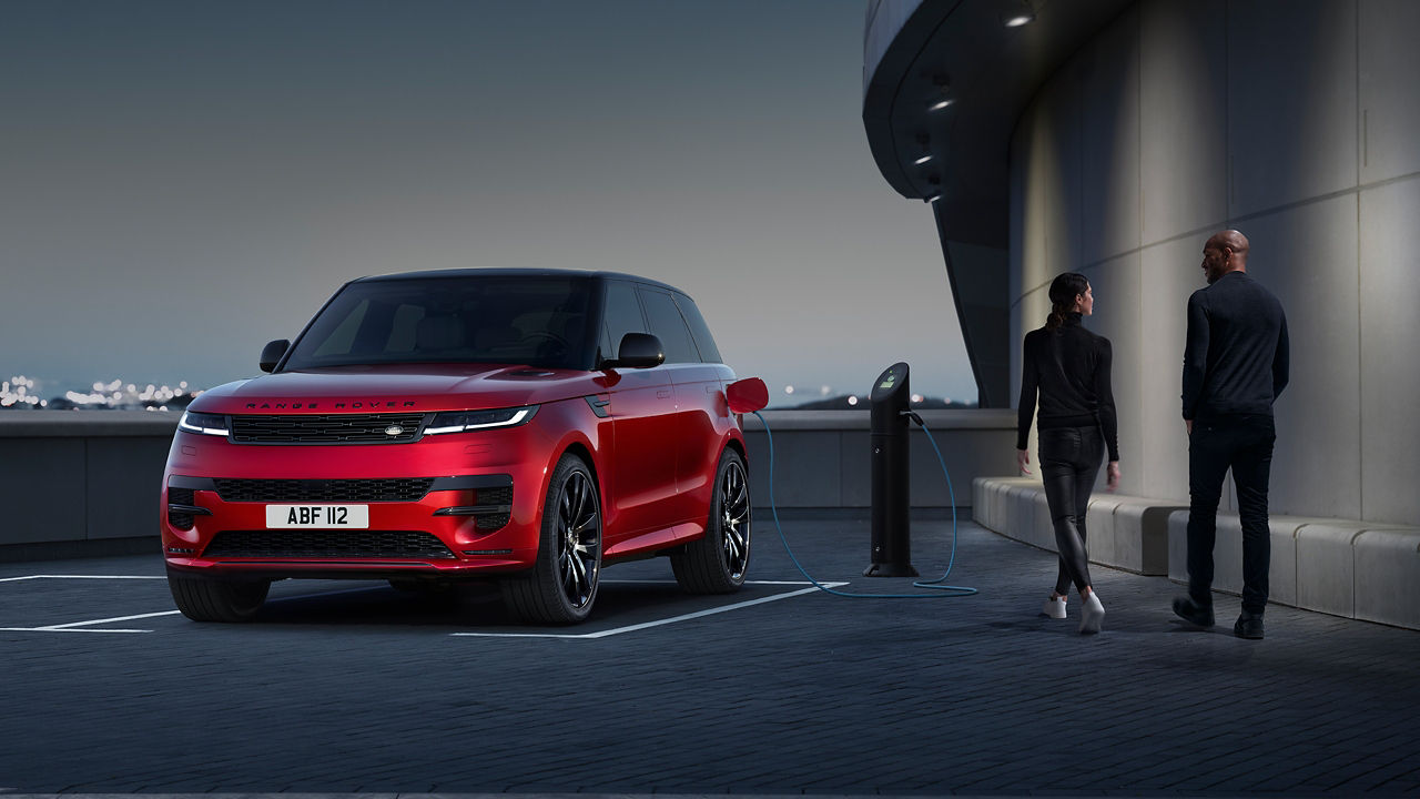 Parked Range Rover Sport charging at the phev station point