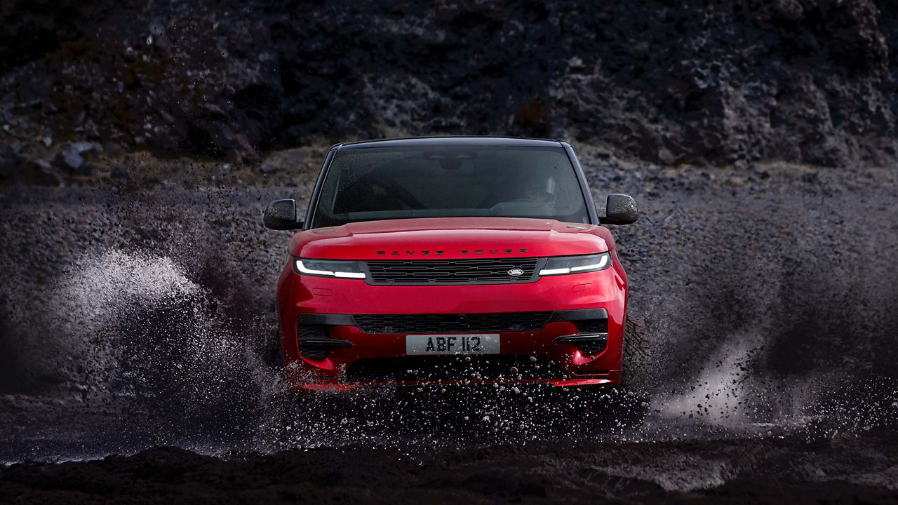 Range Rover Sport driving through mud in Iceland 