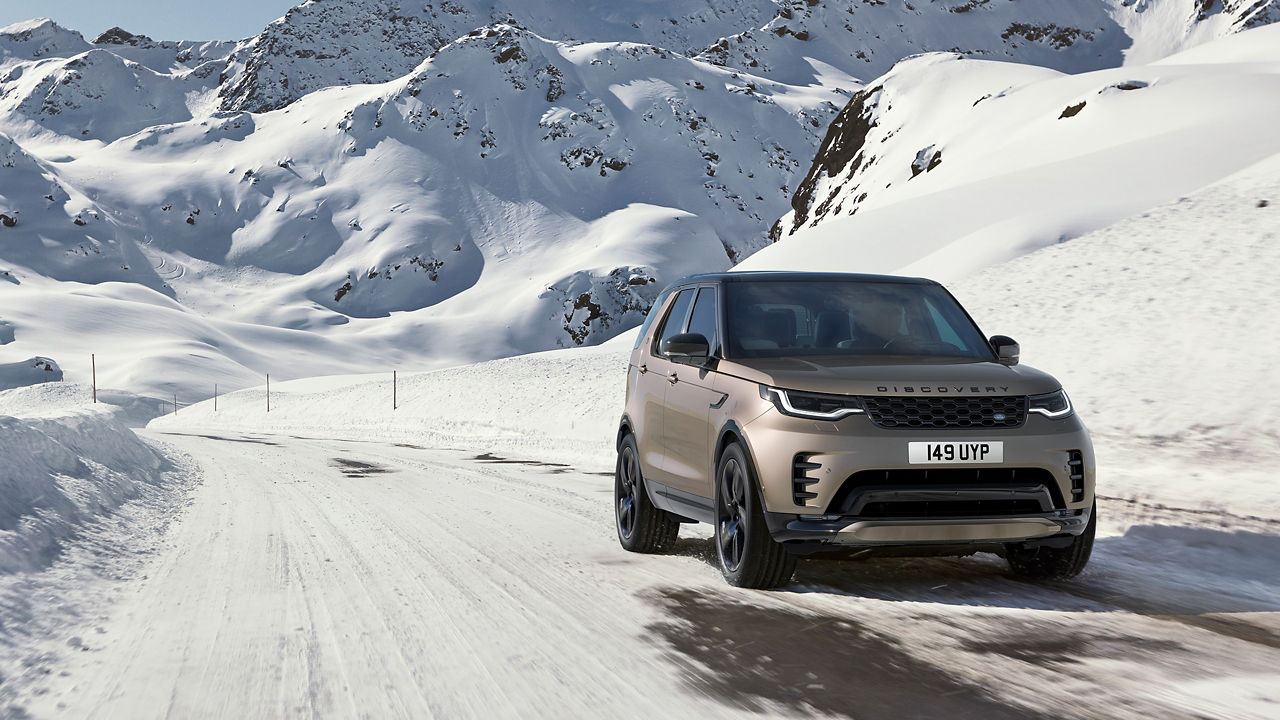 Discovery driving on the snowy road