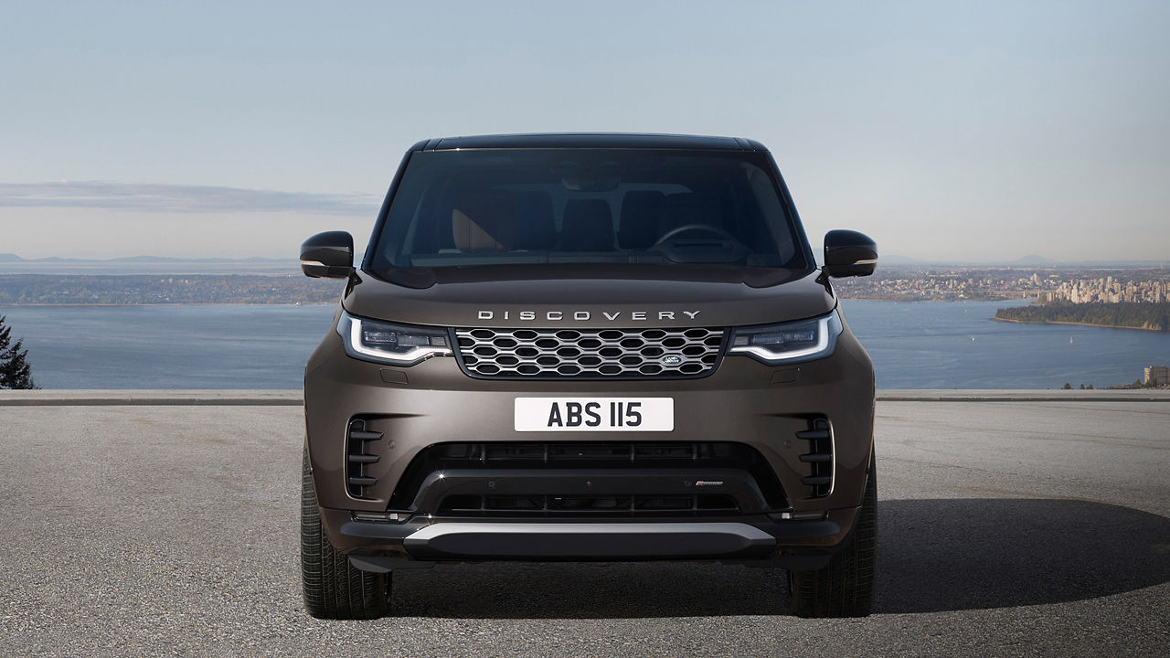 Front view of Discovery in Charente Grey parked outside.