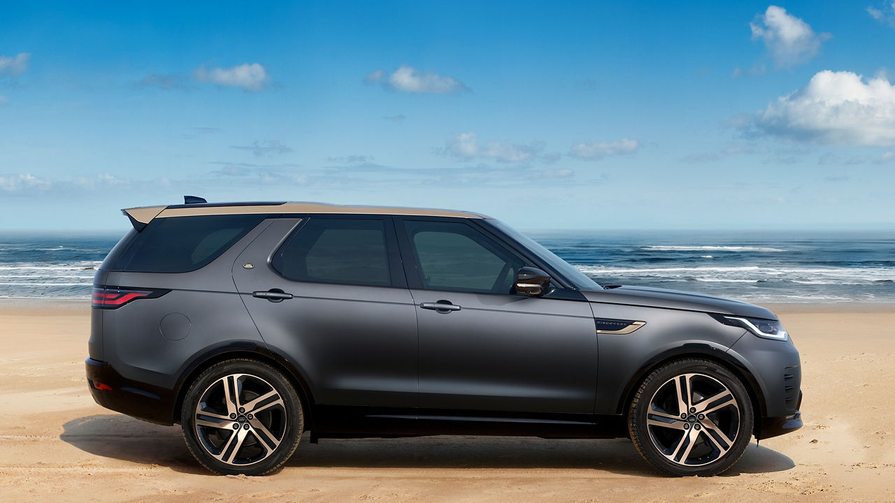 Discovery parked near seashore