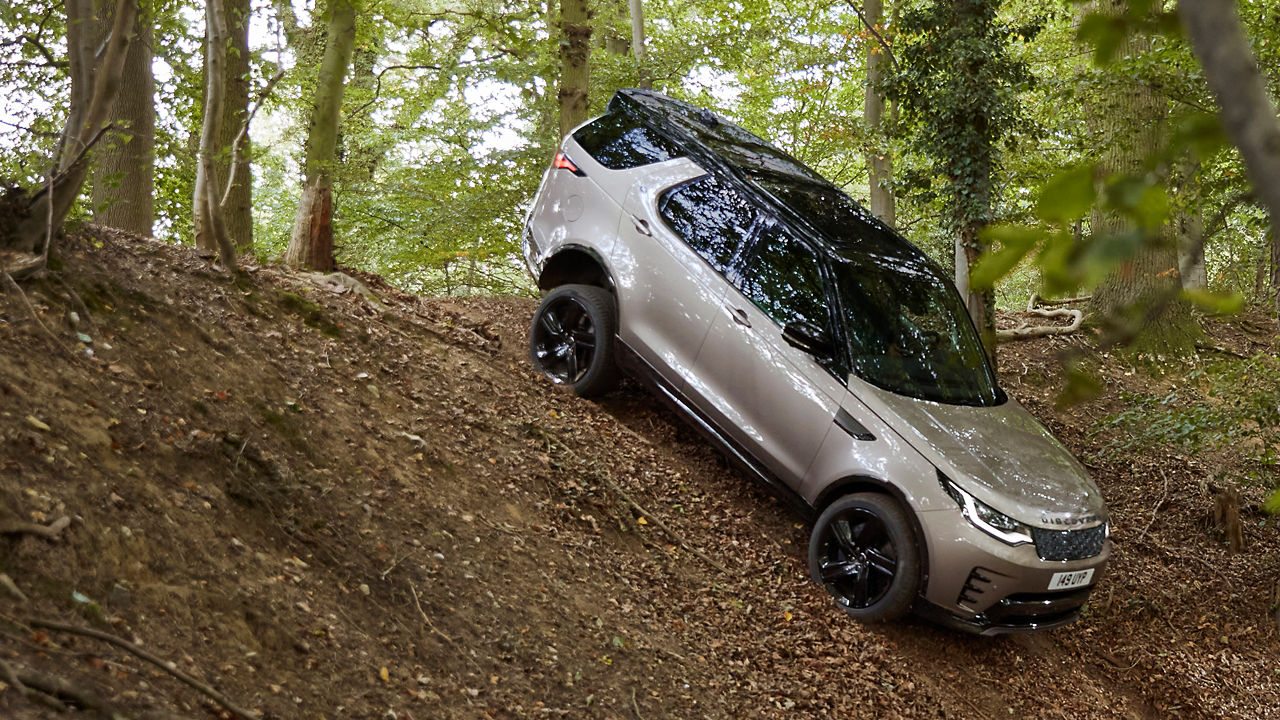 Discovery driving on sloping road