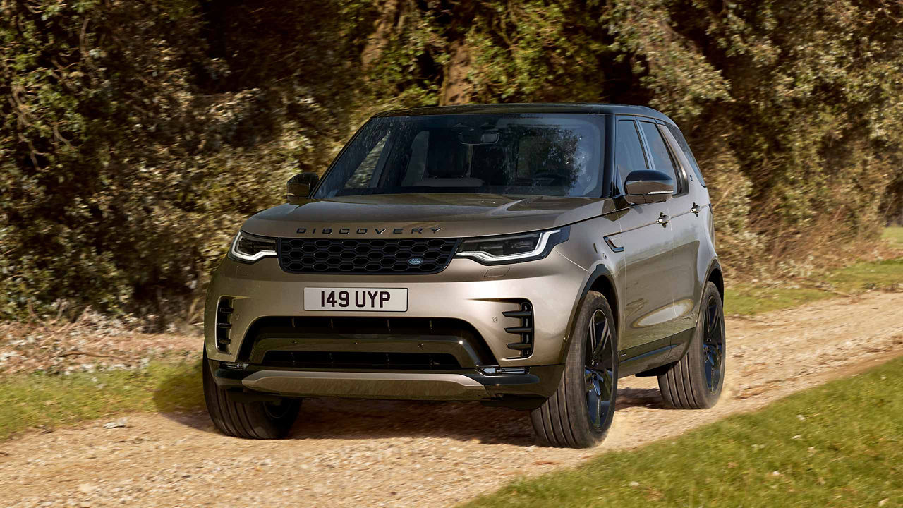 Discovery Driving on Dirt Path 