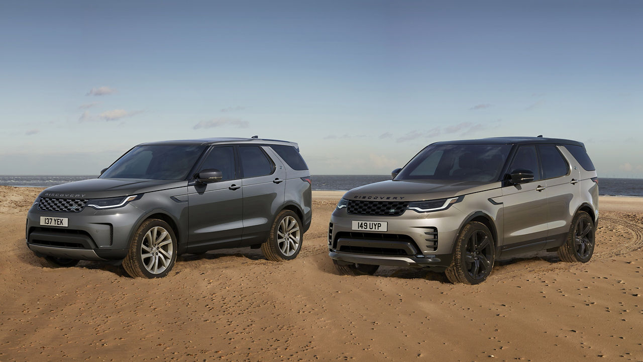 Parked Two Discovery On a Sand Dust