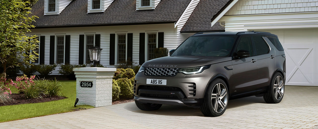 Parked Discovery Outside Of House