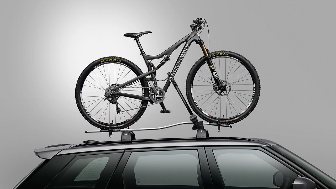 Bicycle mounted bike rack on the roof car