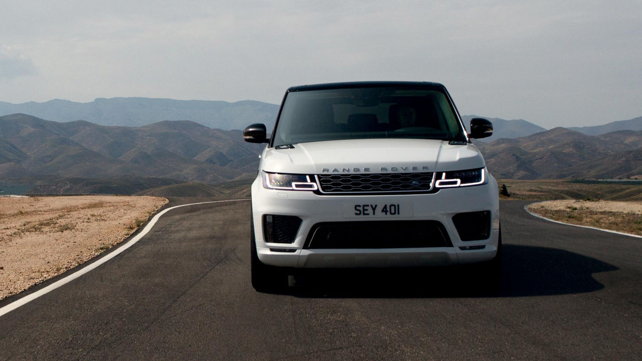 Range Rover Sport Driving On Mountain Runway Road