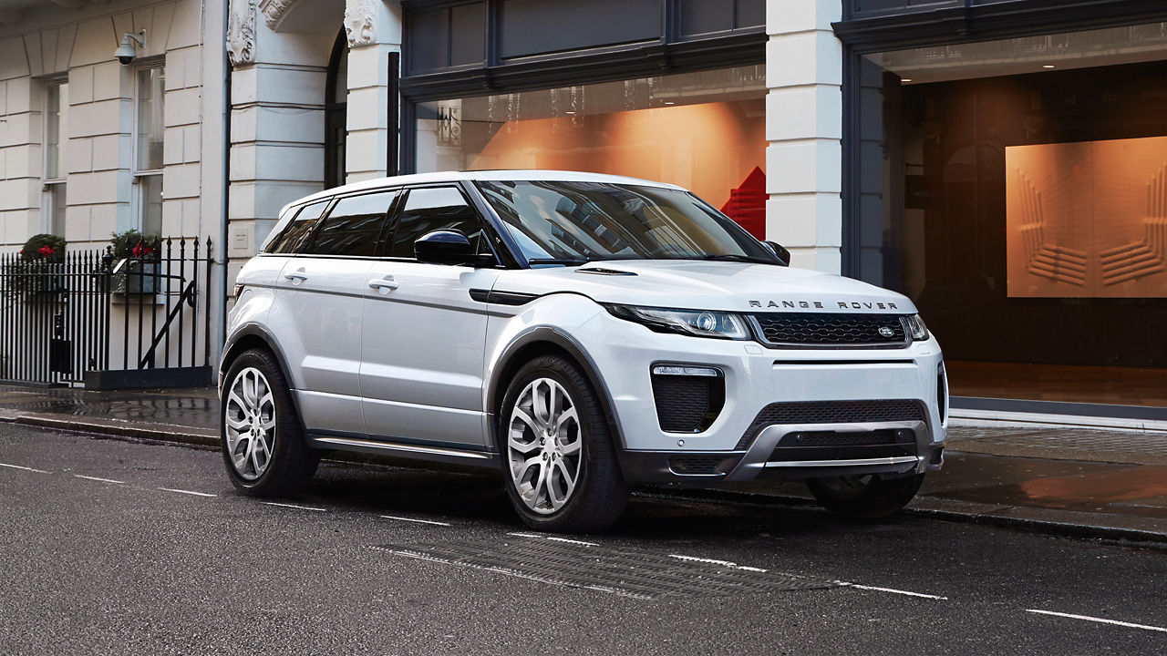 Parked Range Rover Evoque in front of building