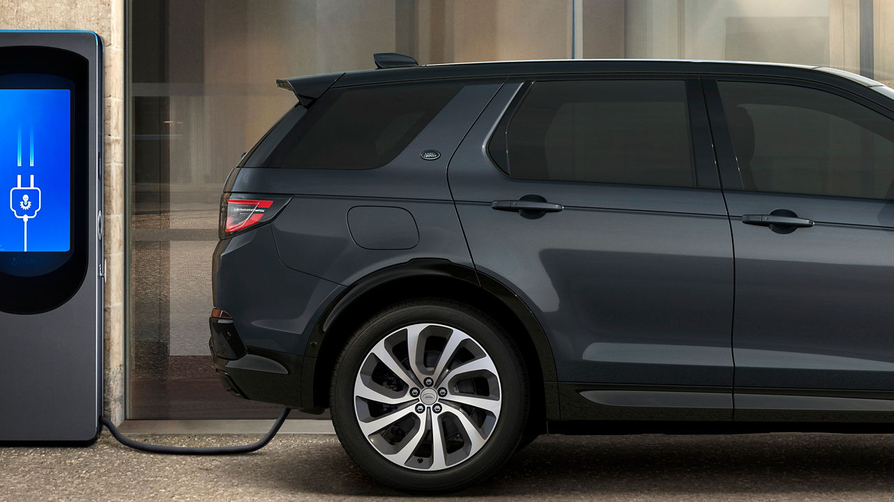 Discovery sport standing at charging Phev point