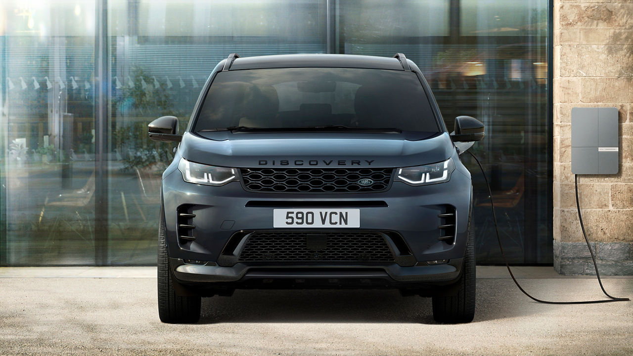 Discovery parked on EV charging station