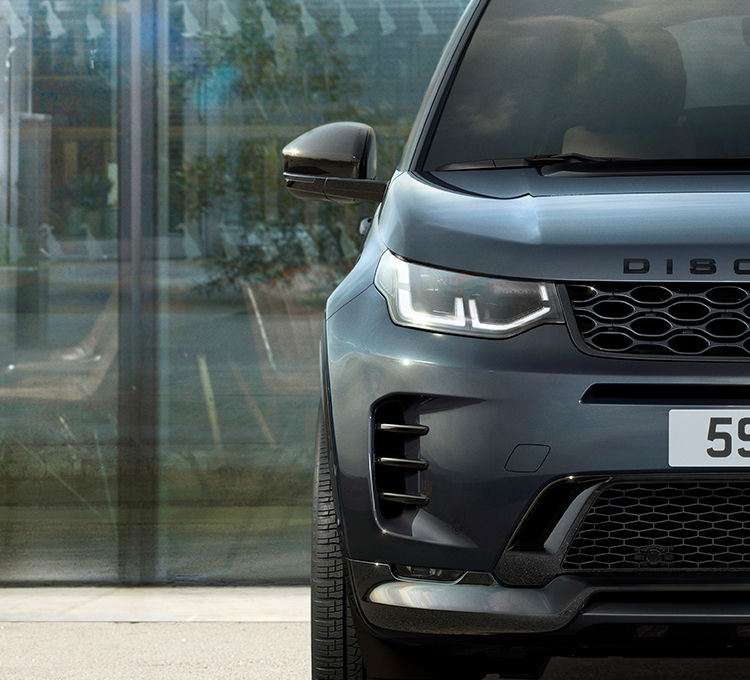 Discovery parked on EV charging station