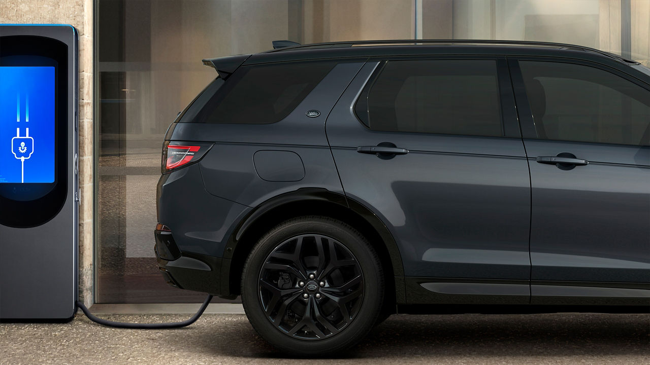 Discovery sport standing at charging Phev point