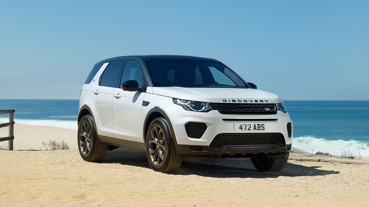 Discovery driving at the sea beach