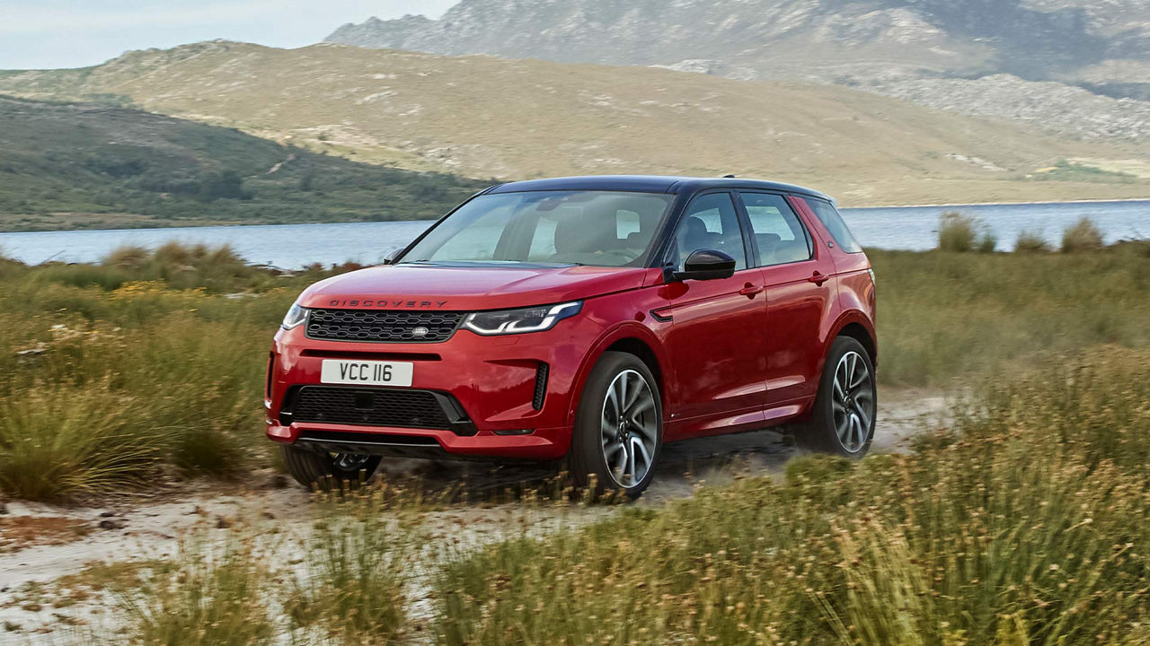 The Discovery parked beside a body of water