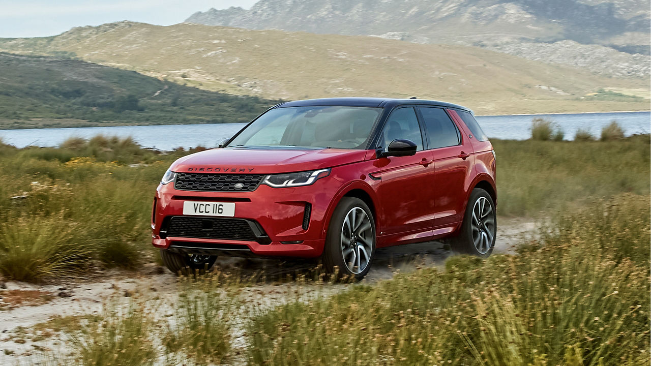 Parked Discovery Sport At River Side Road