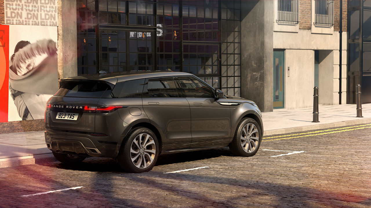 Range Rover Evoque parked beside footpath